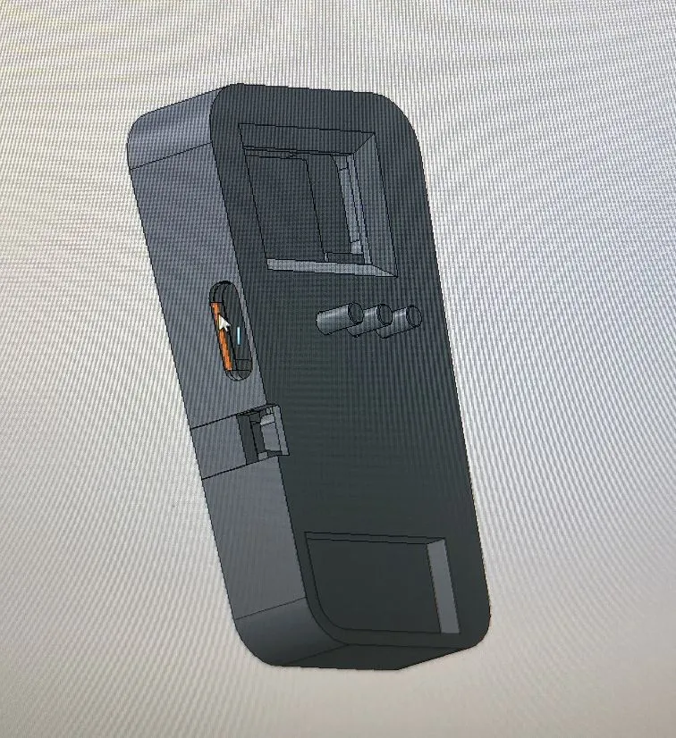 CAD render of a gray handheld enclosure with a USB-C opening on the side.